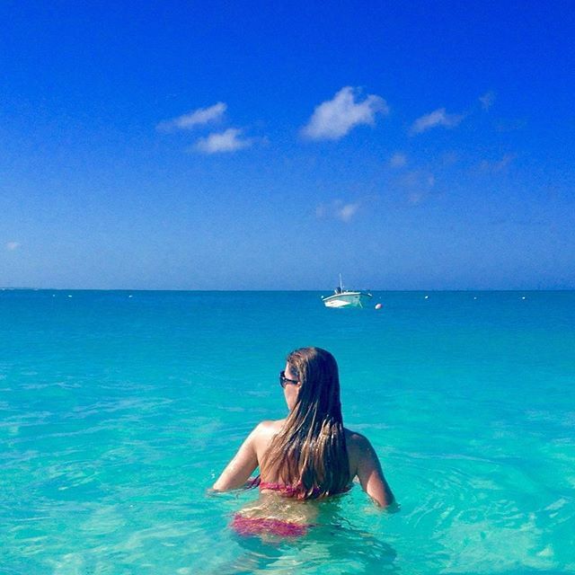 Lady in the sea near The Somerset on Grace Bay