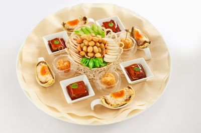 Closeup of a traditional food platter in Goodwood Park Hotel