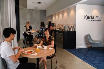 Guests enjoying breakfast served at Nesuto Curtin Perth Hotel