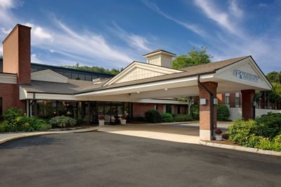 Exterior view of the entrance to Boxboro Regency Hotel