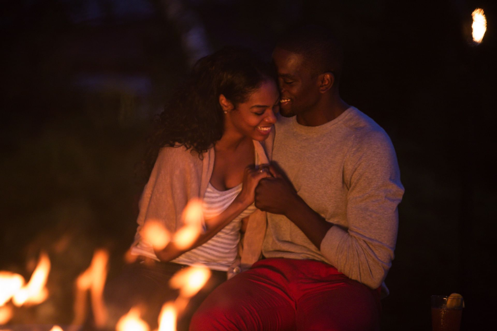 Couple enjoying by the fireplace at Cove Haven Resort