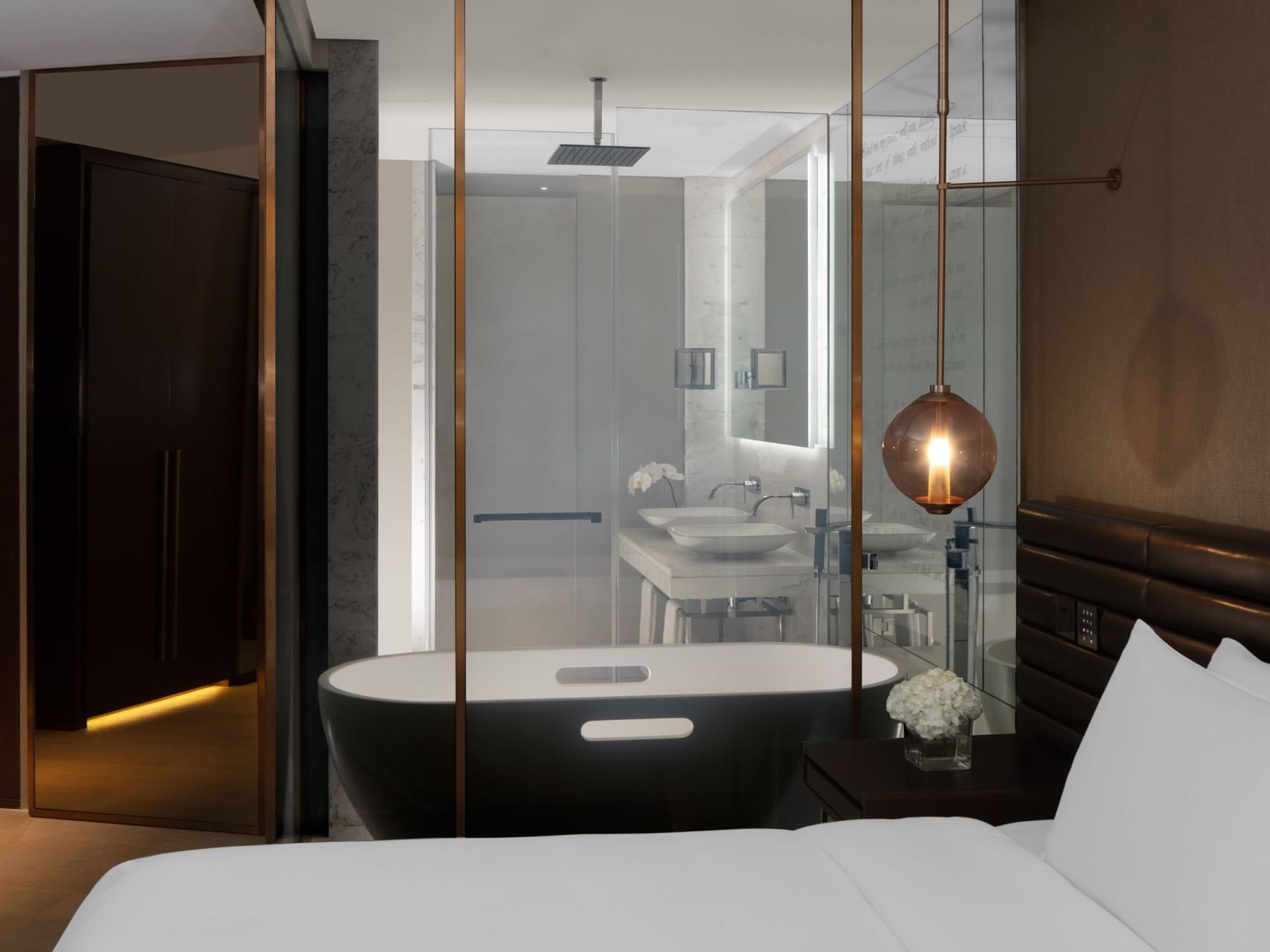 Bed and shower area in Scene Room at Paramount Hotel Dubai