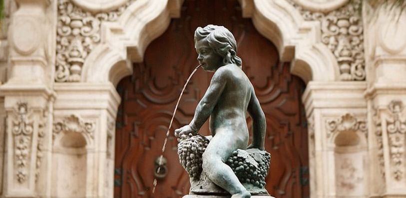 Fountain with a small child figure at Mission Inn Riverside