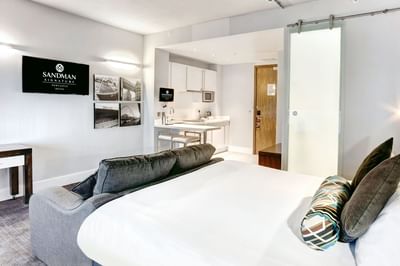 A room and the pantry area at the Sandman Signature Newcastle Ho