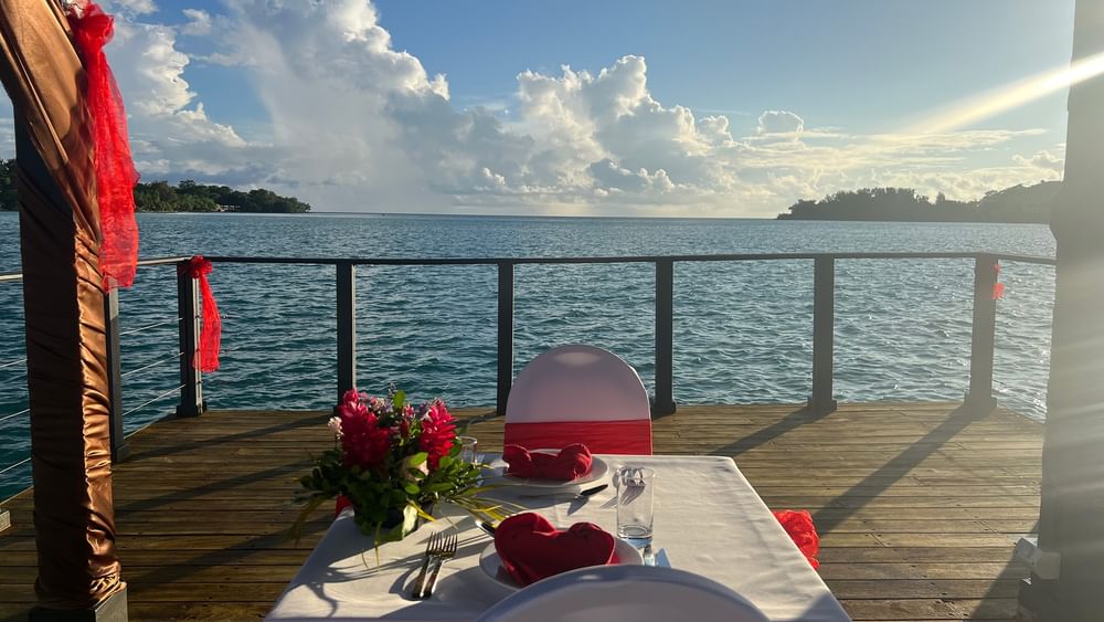Romance and Sunset Cruise dining setup with ocean view at Warwick Le Lagon - Vanuatu, Efate.