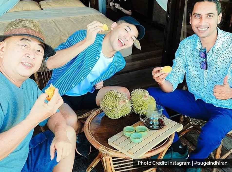 Three tourists were enjoying durians at Balik Pulau - Lexis Suites Penang