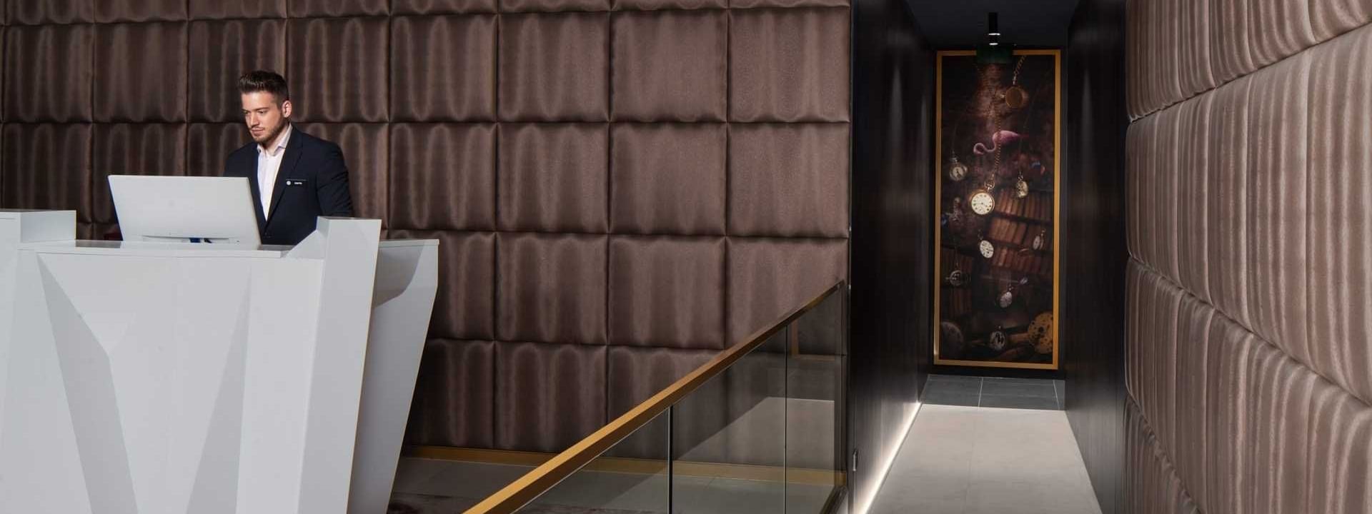 A hallway by the reception at Pullman Melbourne City Centre