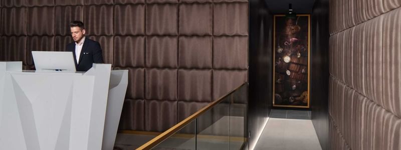 A hallway by the reception at Pullman Melbourne City Centre