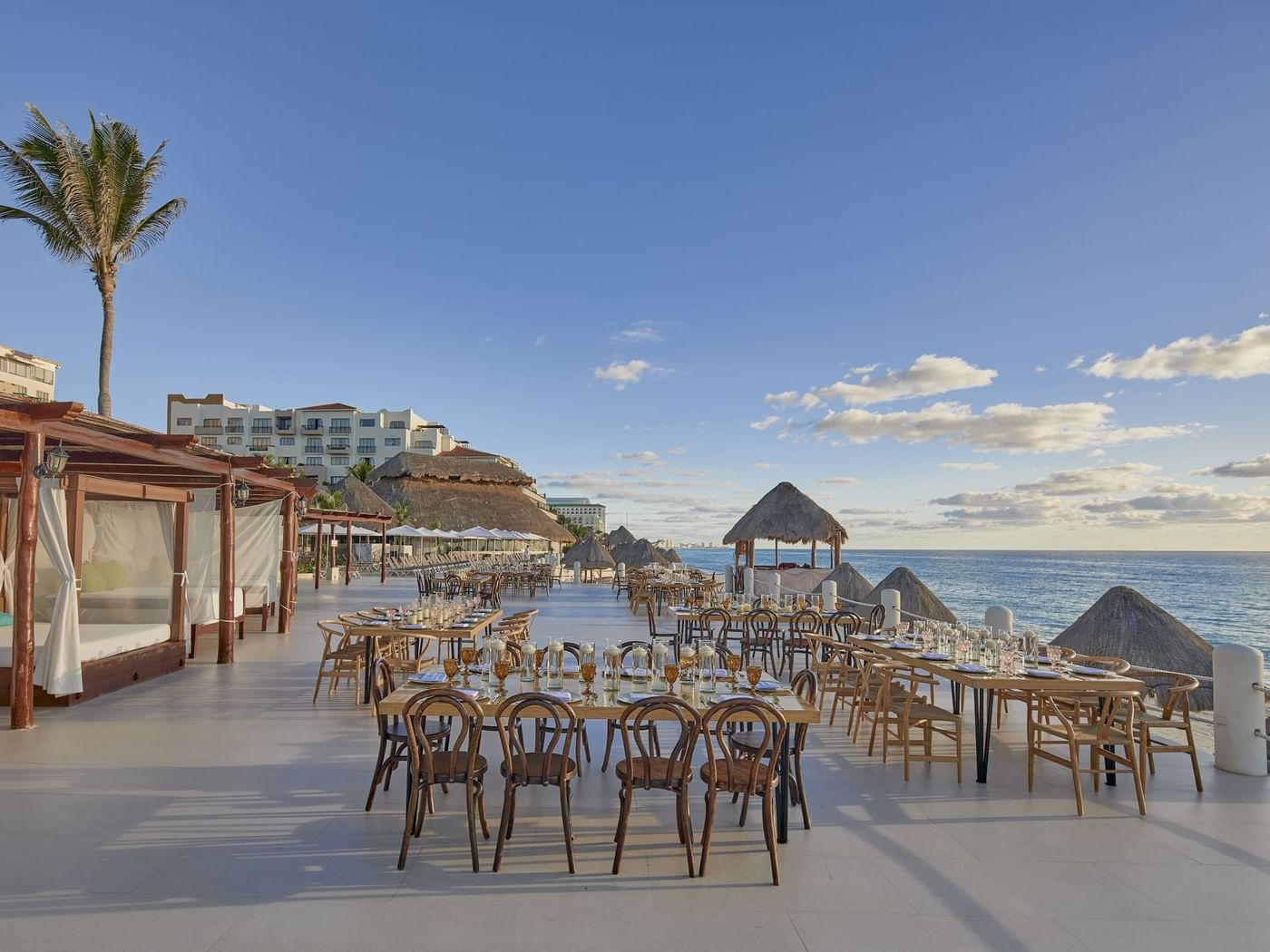 Restaurant with outdoor seating overlooking the ocean at Fiesta Americana