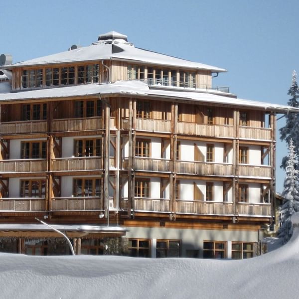 Exterior view of Falkensteiner Hotels & Residences in winter
