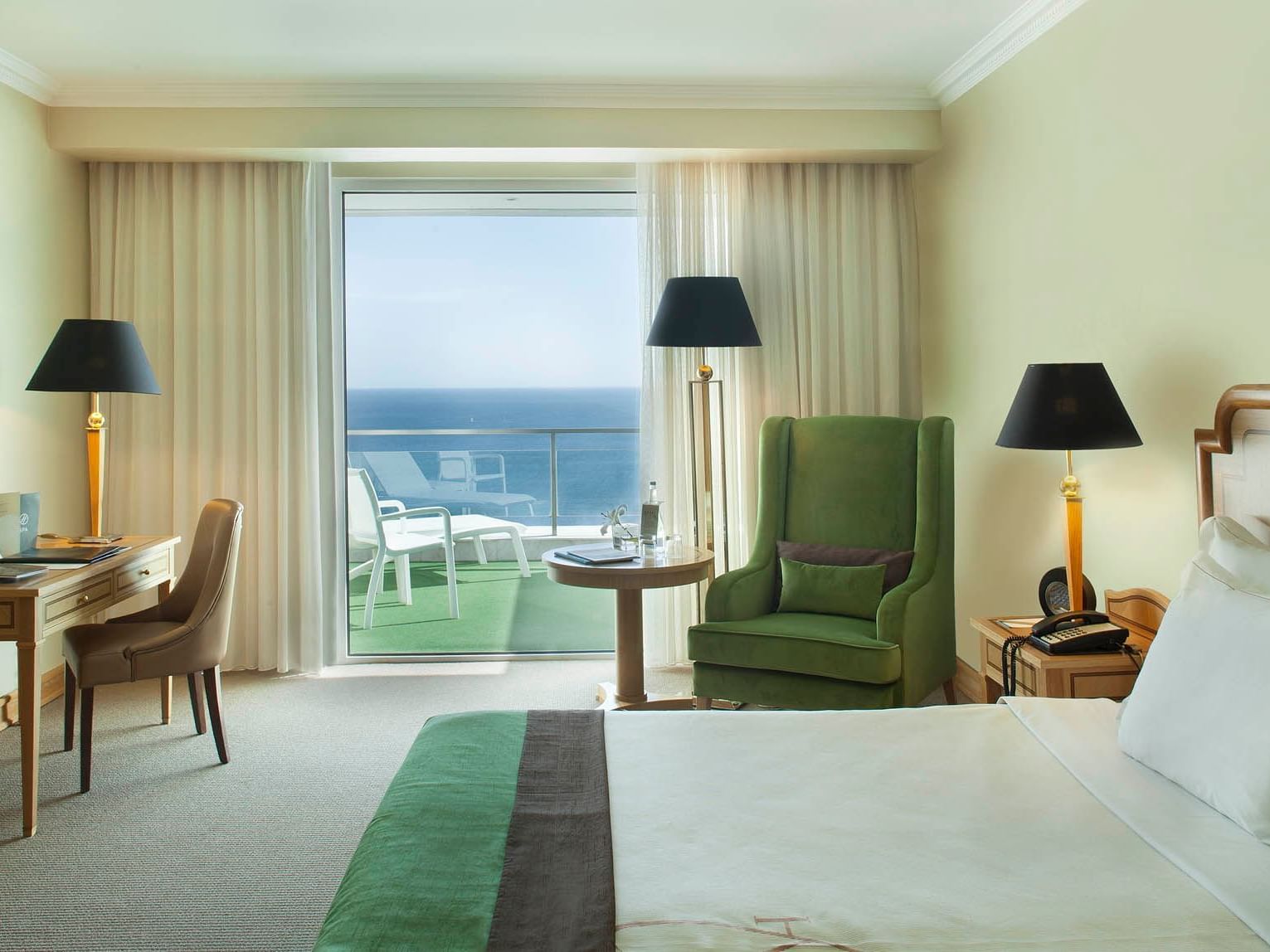Bed & lounge in Family Room Sea View at Hotel Cascais Miragem