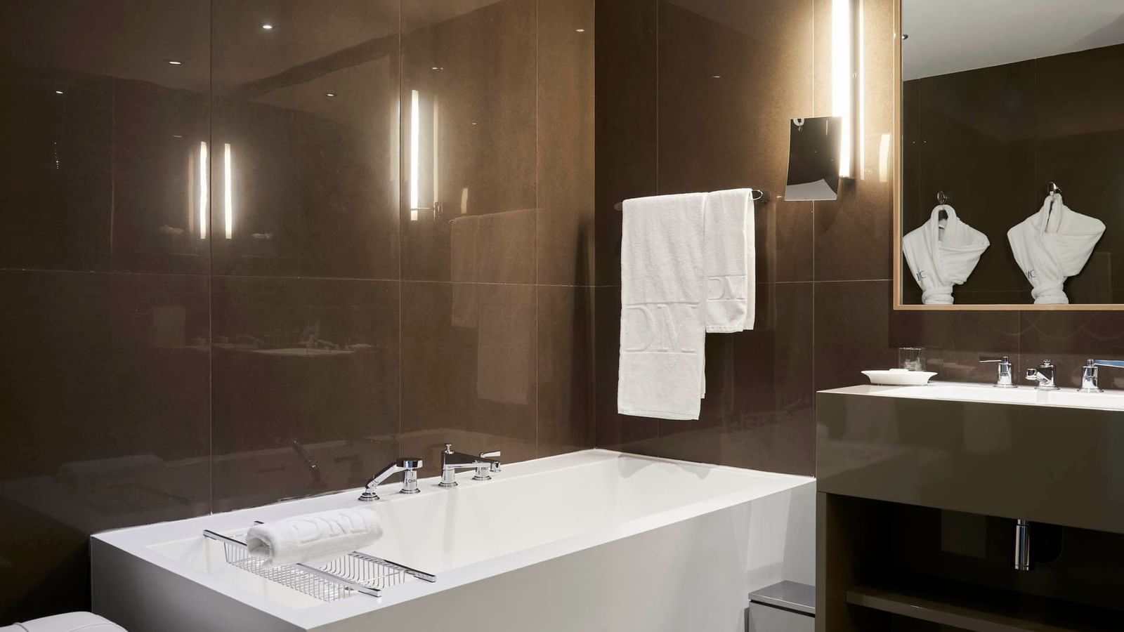 Bathtub & a towel bar in Deluxe Villa at Domaine de Manville