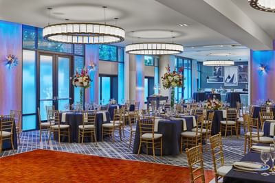 Hall arranged with banquets & flowers for an event at Hotel Republic San Diego