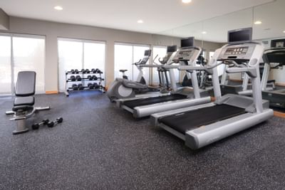 fitness center with cardio equipment