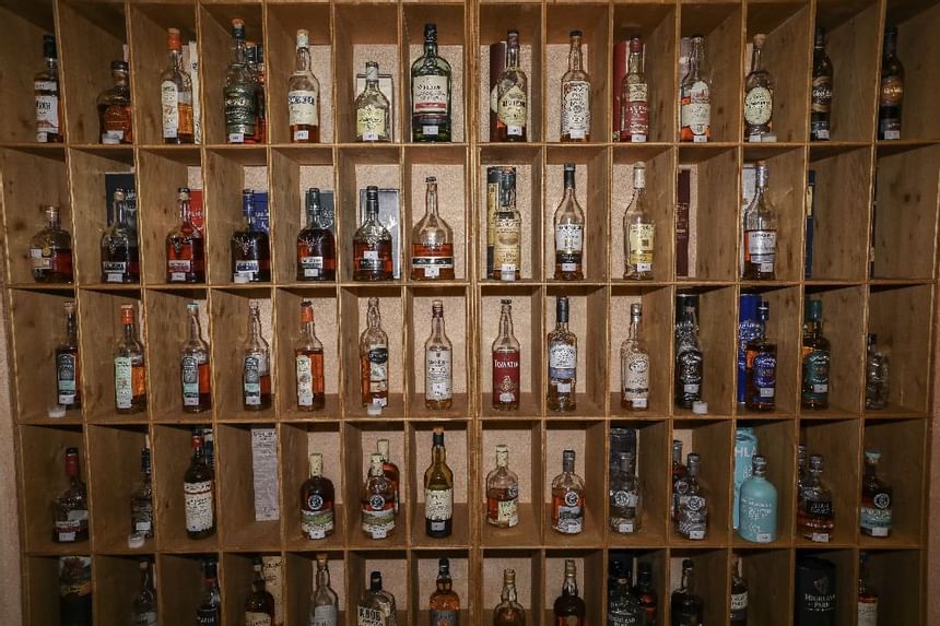 A collection of drinks in Lounge Bar shelf at Liebes Rot