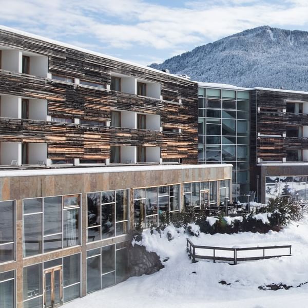 Exterior view of snow covered Falkensteiner Hotel Cristallo