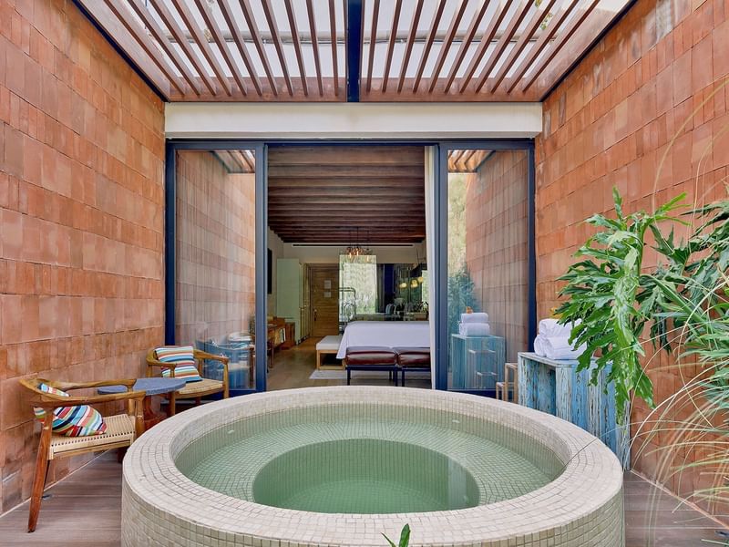 Terrace with hot tub & chairs at Live Aqua San Miguel de Allende