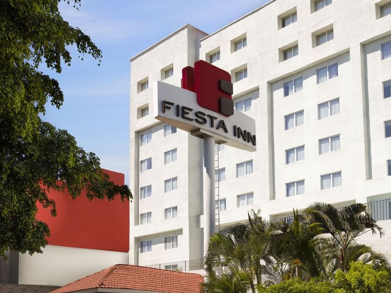 Exterior morning building view of Fiesta Inn Guadalajara Expo