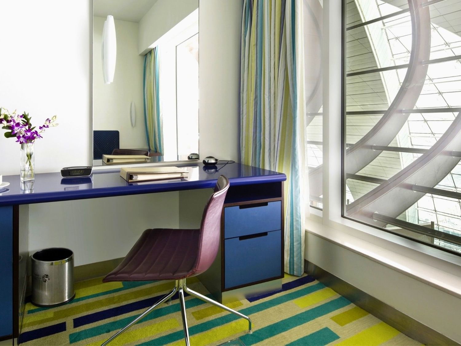 Working table by the window at Deluxe Room at Dubai International Hotel