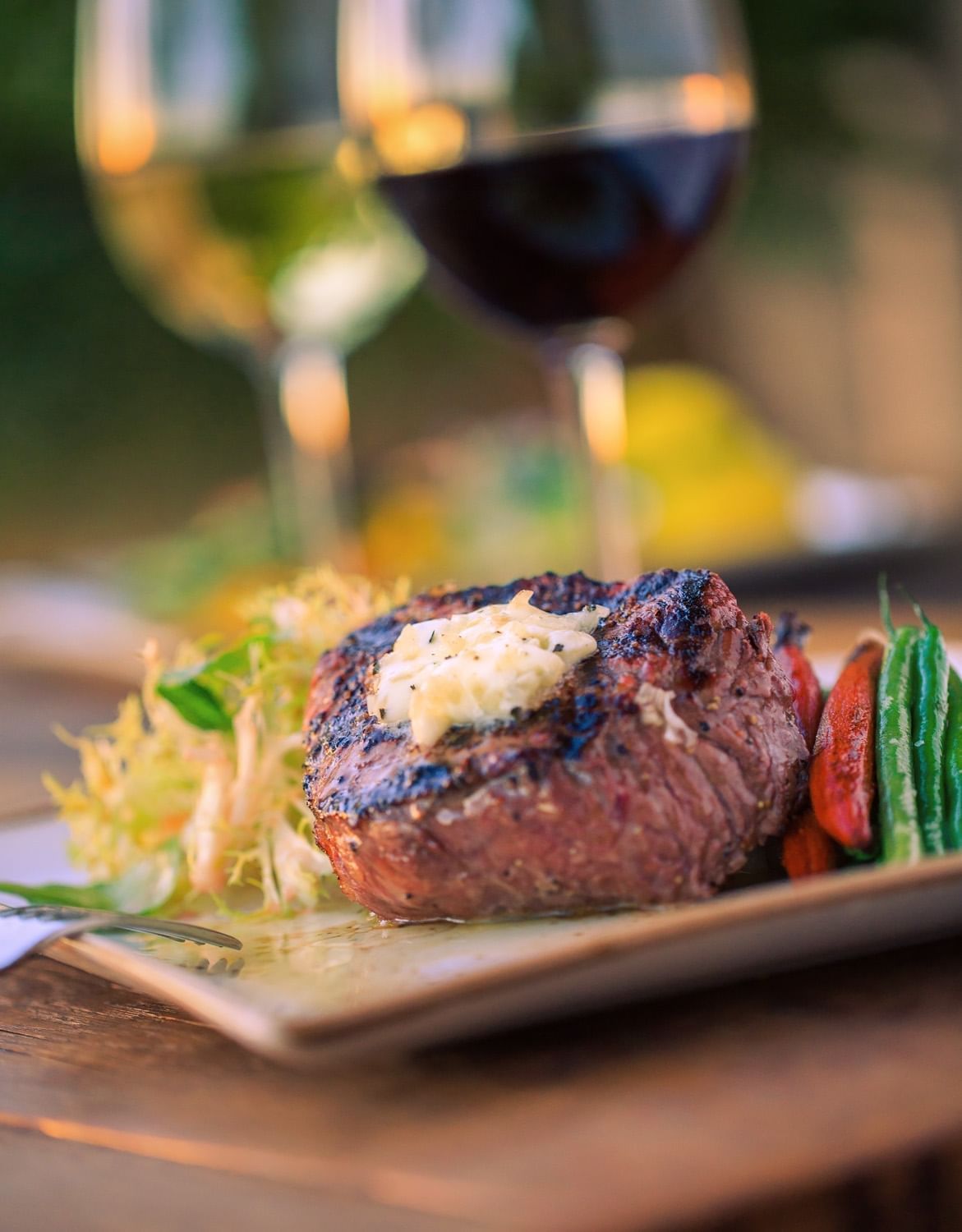 Cello restaurant's filet complimented with greens and carrots. W