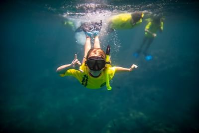 A girl snorkelling at Ka'anapali Beach Hotel Hawaii