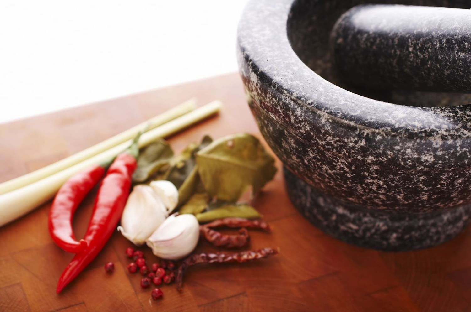 Malaysian spices next to mortar and pestle at Sunway Putra Hotel