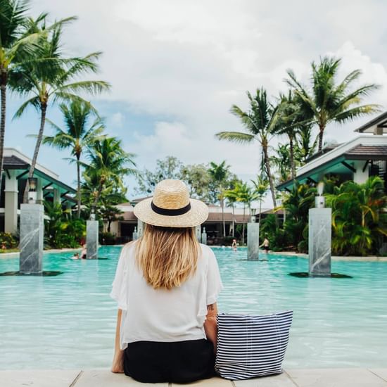 Girl enjoying the pool at Pullman port douglas sea temple resort and spa 