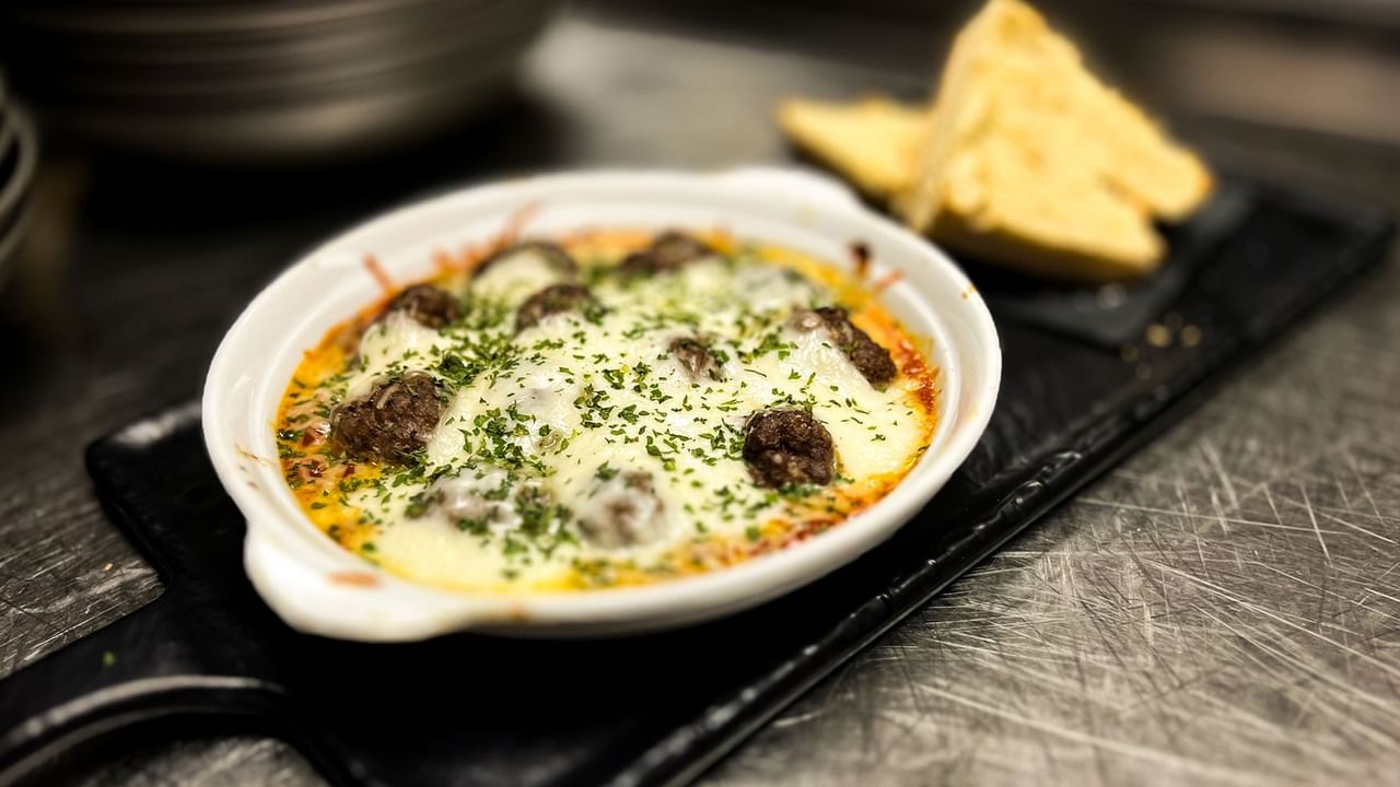Close-up of a plate of food served in Midnight Sun Lounge at Midnight Sun, a Coast Hotel