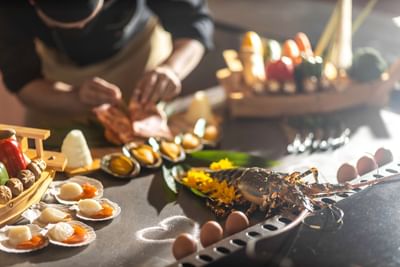 Chef preparing fine dishes at Hanoi Daewoo Hotel
