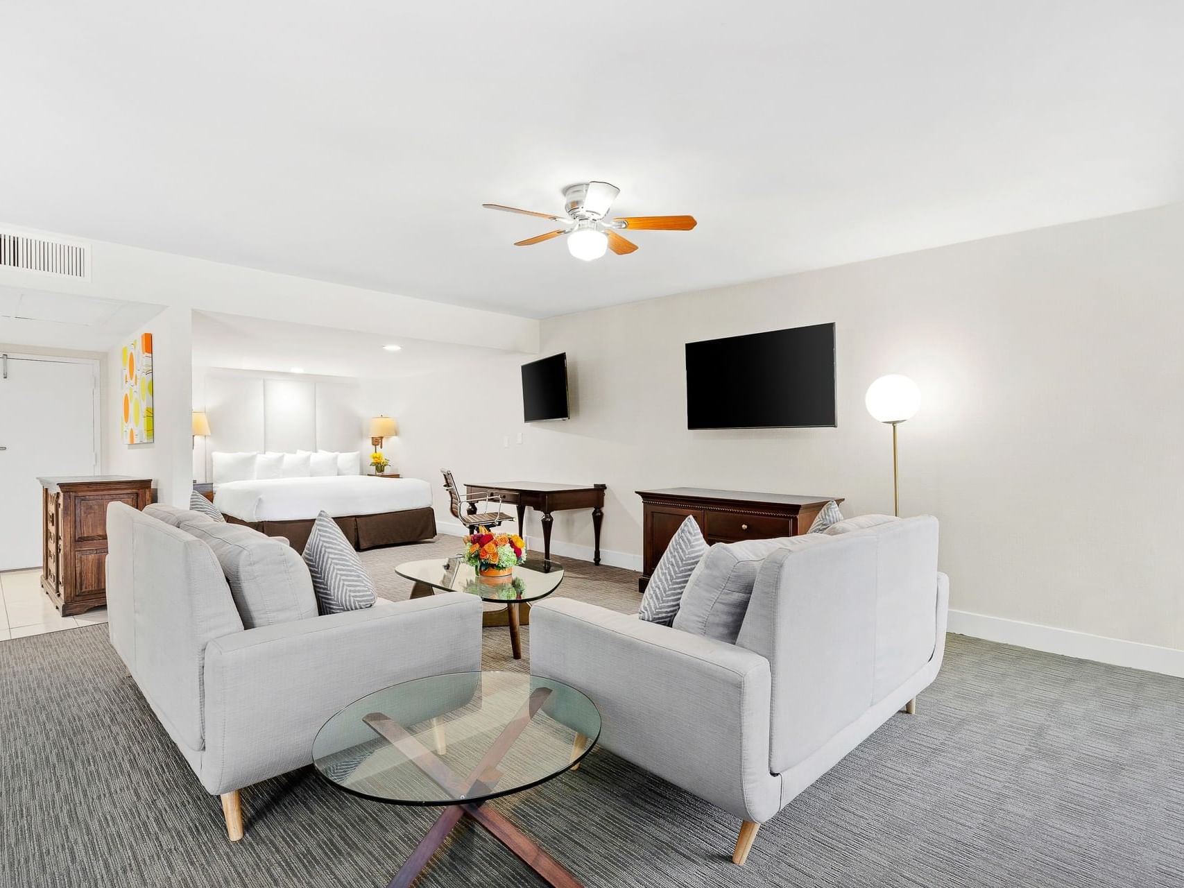 Sofa & TV in living area of a Family Suite at The Anaheim Hotel