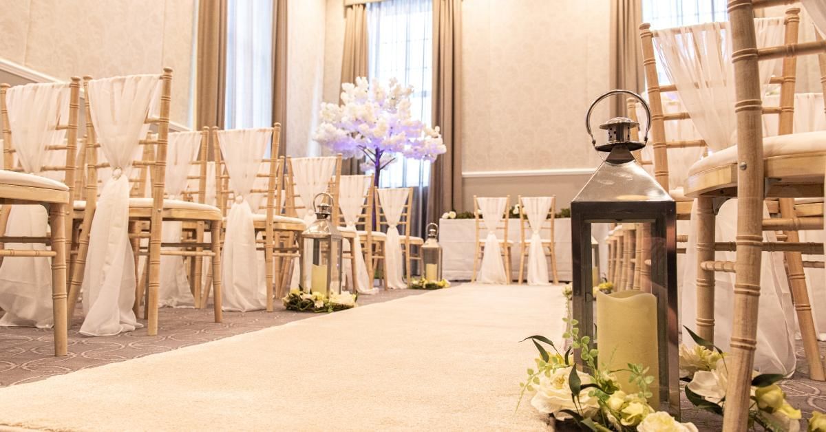Wedding ceremony set up in ballroom for wedding fair in Buckinghamshire at Villiers Hotel
