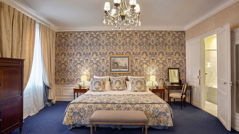 Bedroom arranged in Prestige Suite at Westminster Warwick Paris