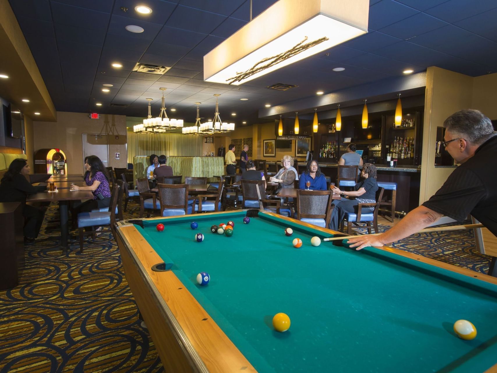 People lounging, Topsy Turvey Lounge at Rosen Inn International