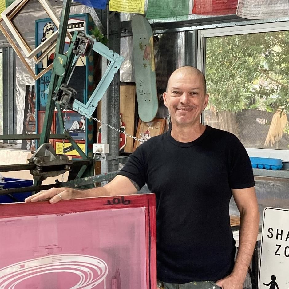 Artist of Franck Gohier posing in Mitchell Fine Art Gallery near Sofitel Brisbane Central