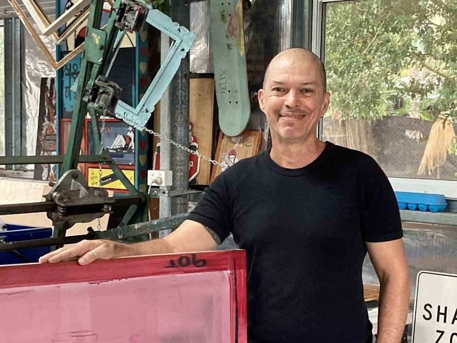 Artist of Franck Gohier posing in Mitchell Fine Art Gallery near Sofitel Brisbane Central