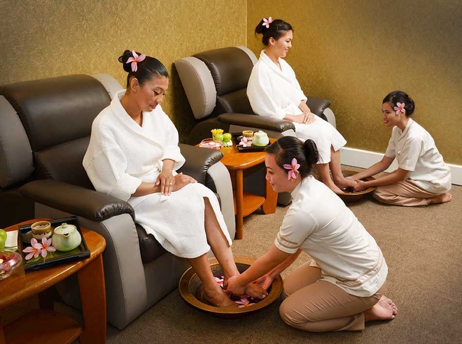 Two ladies receiving a foot massage - Grand Lexis Port Dickson