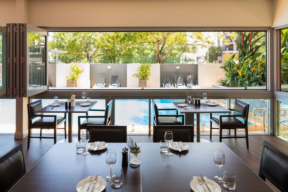 Dining area by the pool Dbar & restaurant at H On Smith Hotel