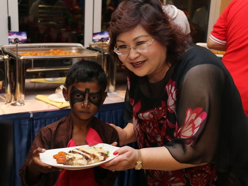 Lexis Hotel fetes 38 kids from welfare home to an early treat