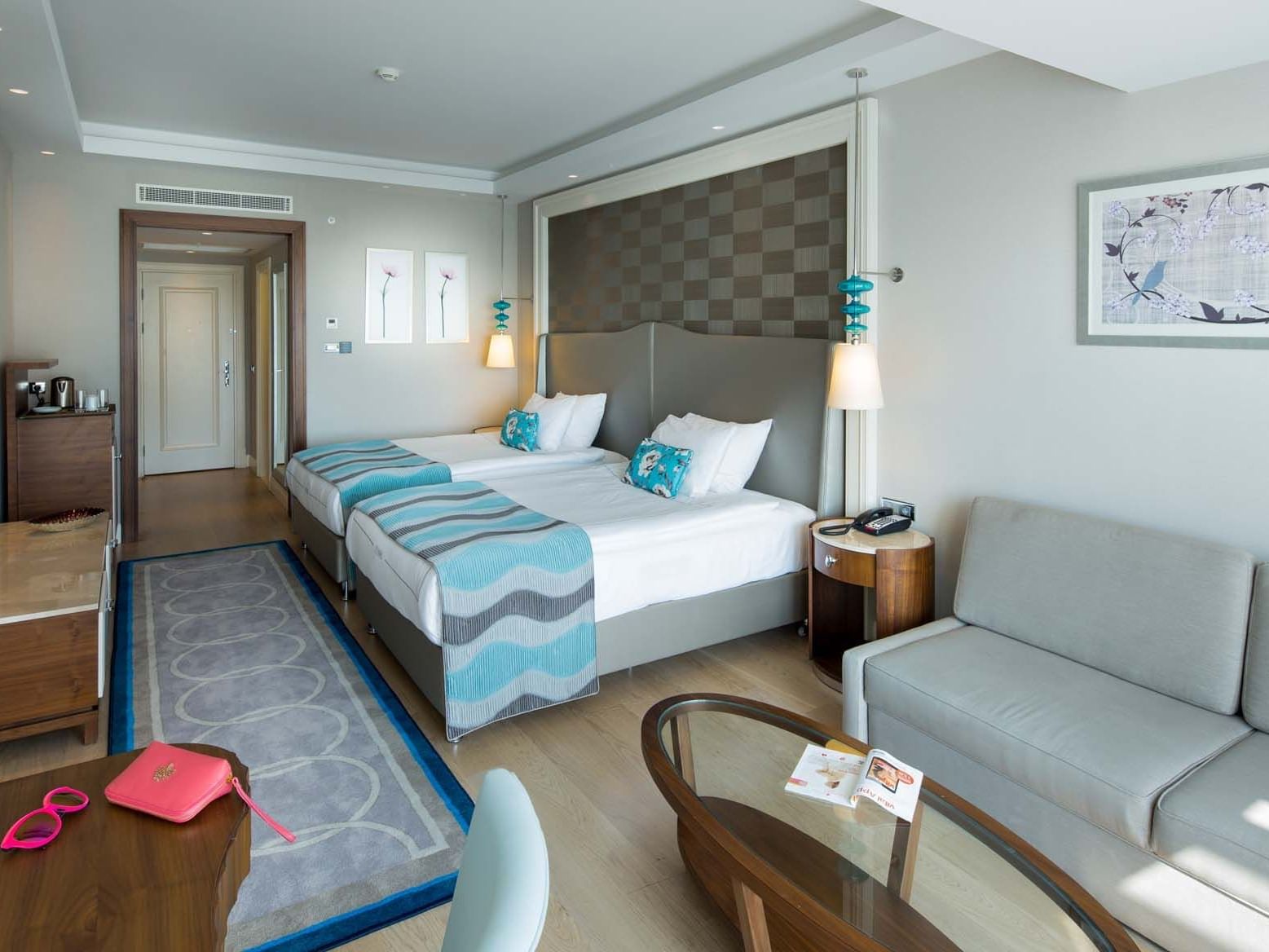 Sofa & work desk by the beds in Superior Room at Titanic Deluxe Golf Belek