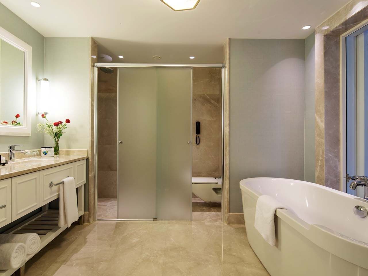 Bathroom with vanity & tub in Exclusive Pool Villa at Titanic Deluxe Golf Belek