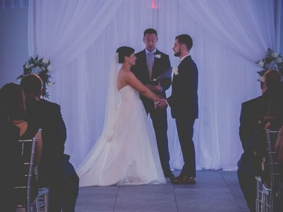 bride and groom saying their vows