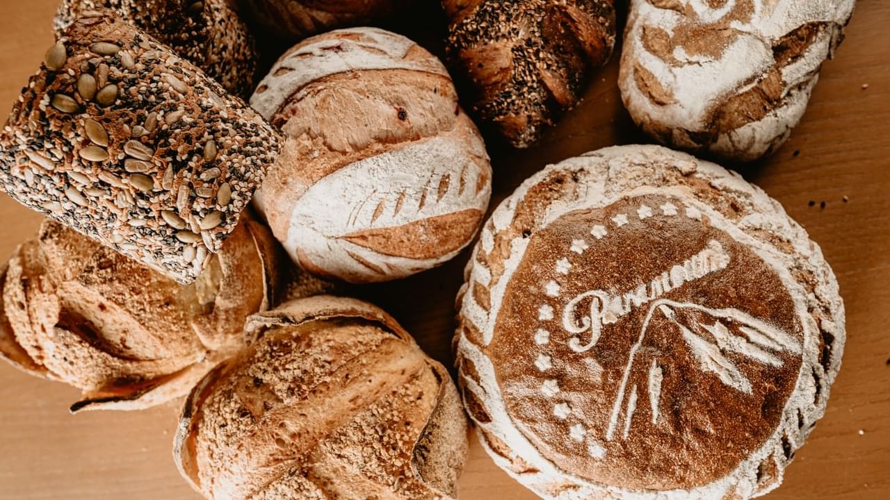 Baked bread on a table in Craft Table Artisan Café & Bakery at Paramount Hotel Dubai