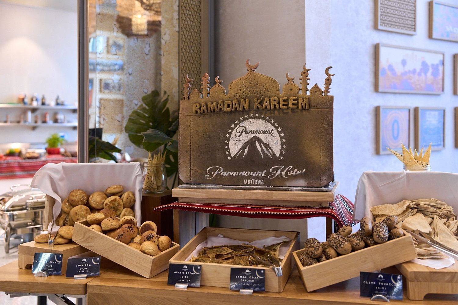 Cinescope Restaurant entrance with Ramadan Kareem board and breads served on a table at Paramount Hotel Midtown