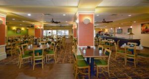 Dining tables in The Palm Dining Room at Rosen Inn Universal