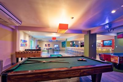 Closeup of pool table & soccer table at Fiesta Resort