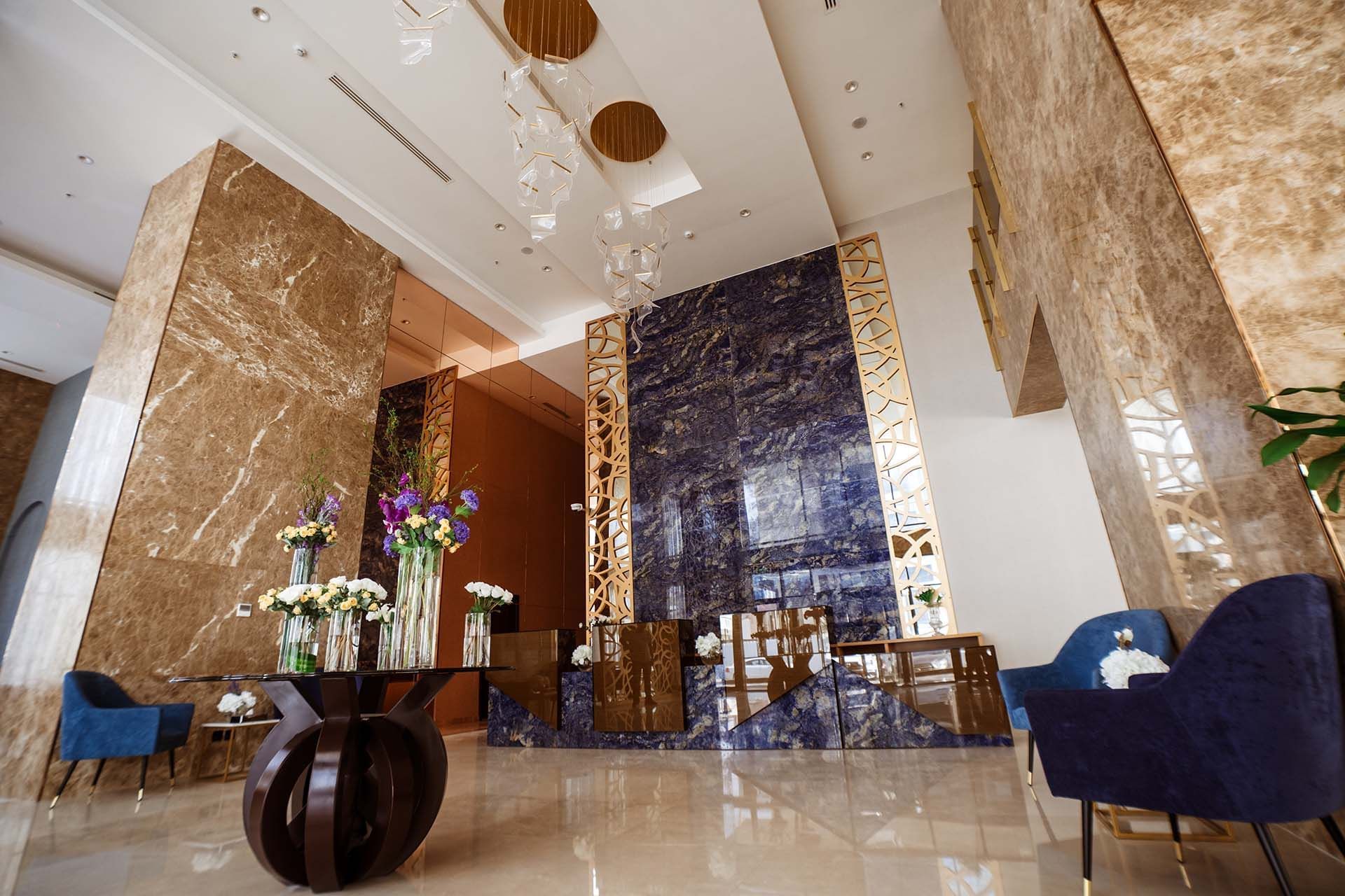 Low-angle view of the lobby Area at Cantonal Hotel by Warwick Riyadh