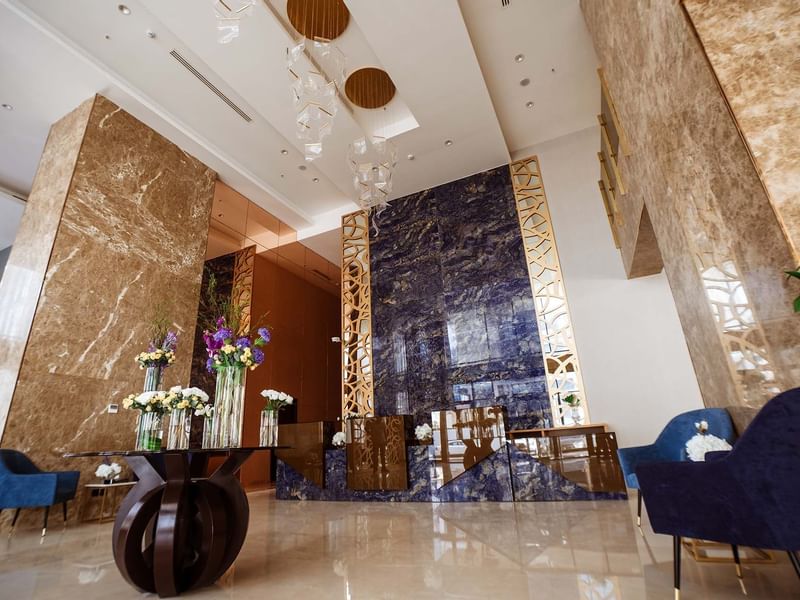 Low-angle view of the lobby area at Cantonal Hotel by Warwick Riyadh