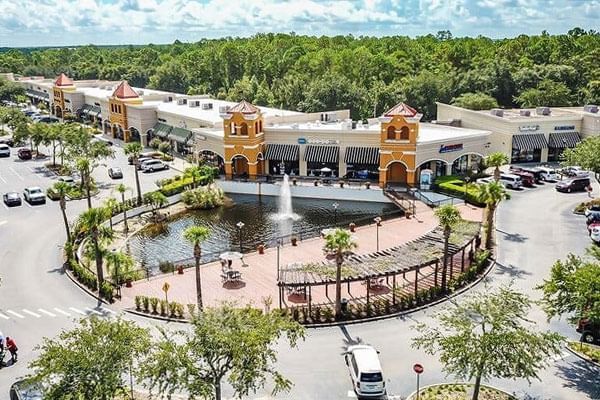 Aerial view of Factory Stores with water fountain at Lake Buena Vista Resort Village & Spa