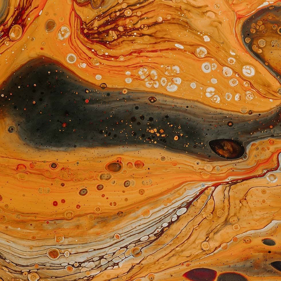 Marbling pattern with swirls of black & orange at Geopark Visitor's center near Falkensteiner Hotel & Spa Carinzia