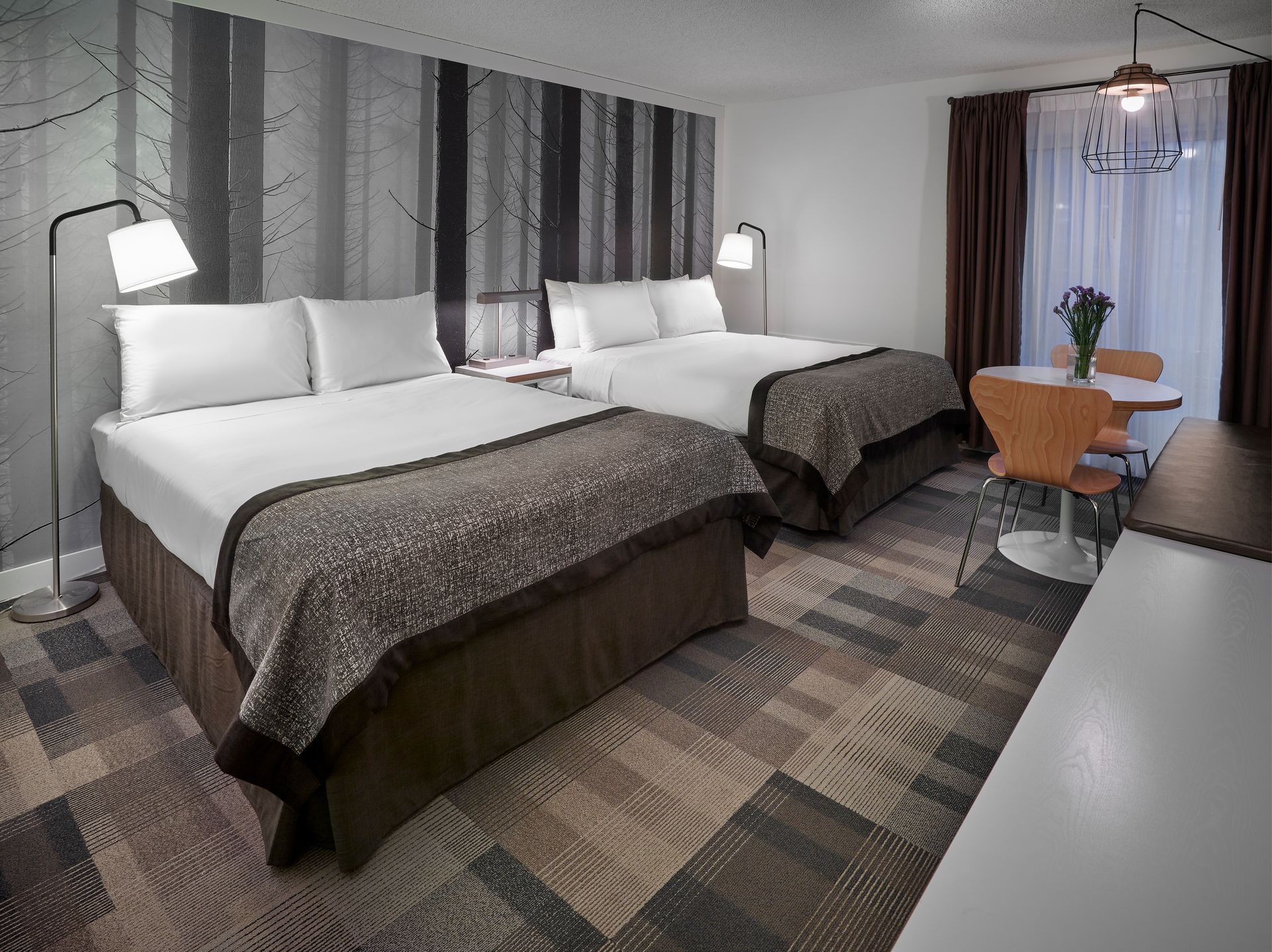Two beds in modern hotel room